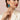 A model is wearing long gold earrings - Franca in turquoise. Een model draagt lange goude oorbellen - Franca in turquoise. 