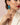 A model is wearing long gold earrings - Franca in turquoise. Een model draagt lange goude oorbellen - Franca in turquoise. 